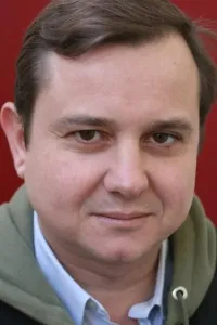 Александр Комартен